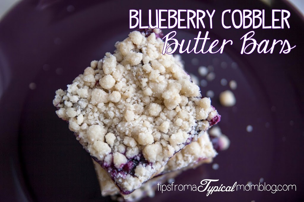 Blueberry Cobbler Butter Bars recipe from Tips From a Typical Mom. These are the perfect mixture of cobbler and butter cookies. So yummy!