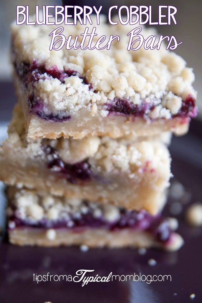 Blueberry Cobbler Butter Bars recipe from Tips From a Typical Mom. These are the perfect mixture of cobbler and butter cookies. So yummy!